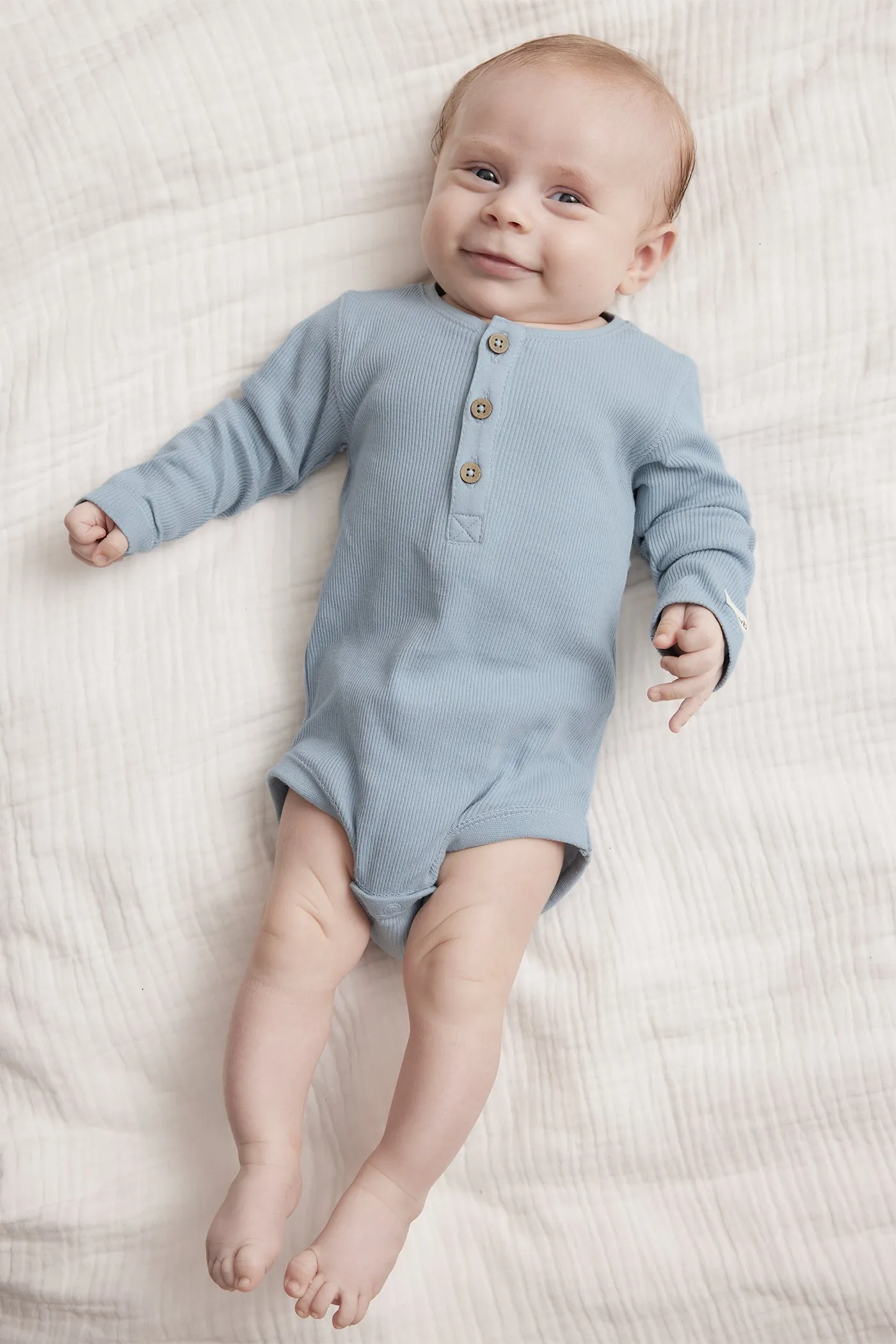 Baby blue ribbed bodysuit