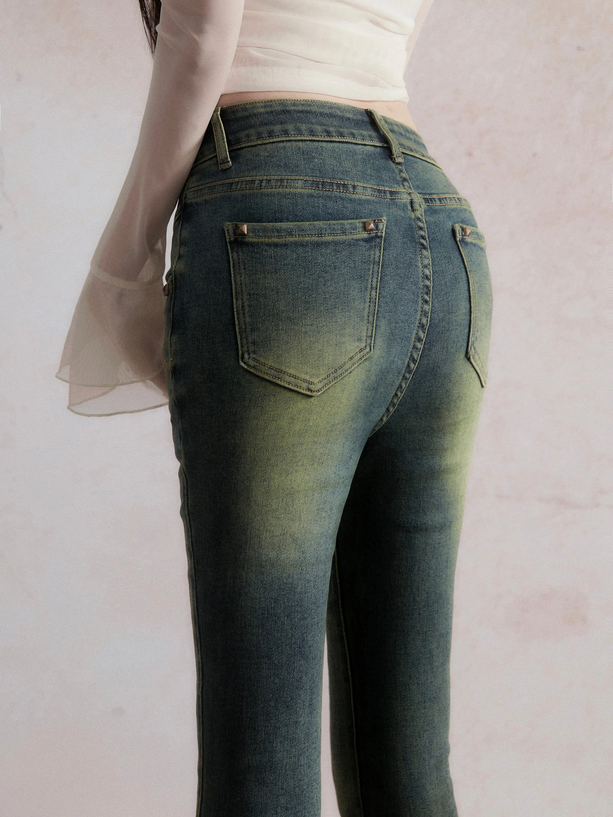 Damaged slim flared denim pants